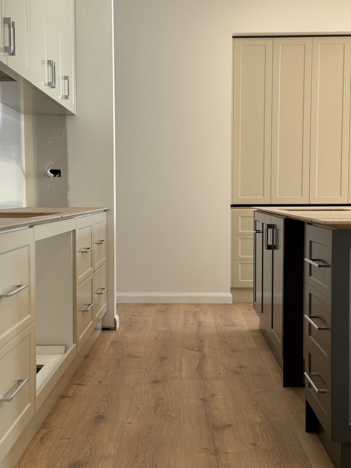 Custom kitchen cabinetry during installation